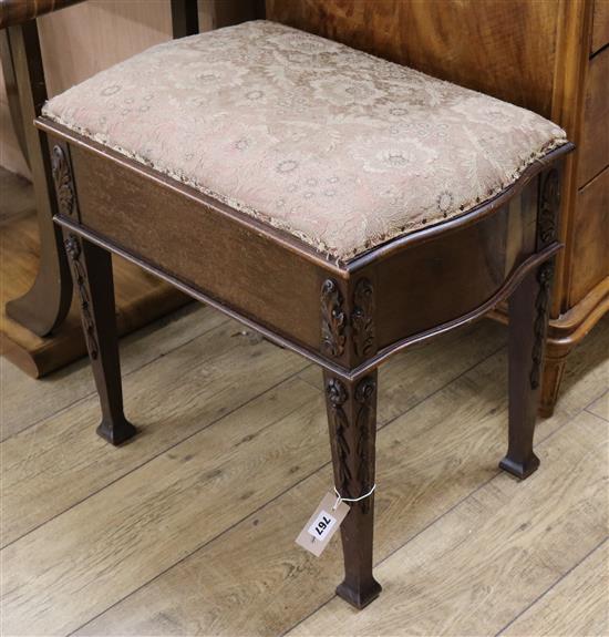 An Edwardian carved mahogany box seat piano stool W.61cm